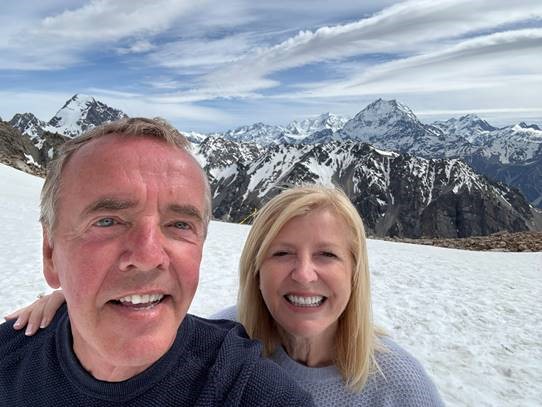 Happy clients exploring New Zealands snowy peaks