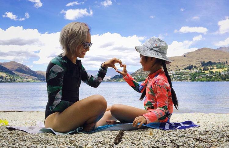 Family relax on Queenstown foreshore