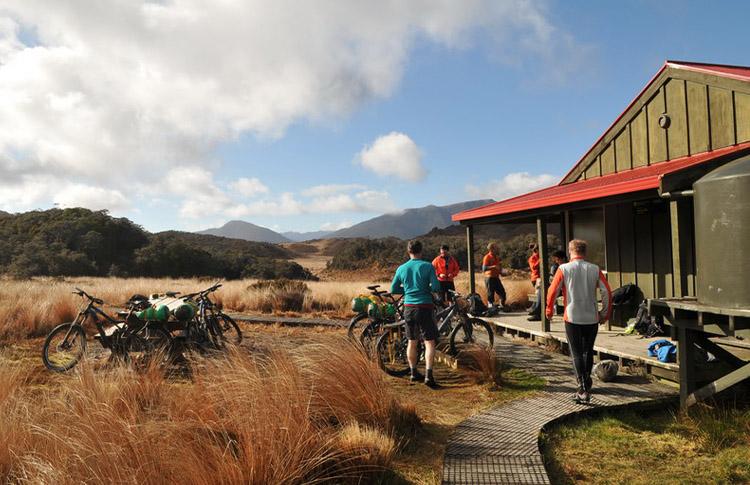 Heaphy Hut with bikers