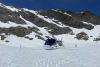 Helicopter landing on the snow