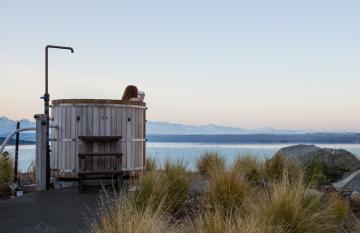 Soak in a hot tub during winter